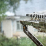 rain flows down from a roof down
