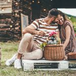 Lovely couple having having their moment with glass of brandy